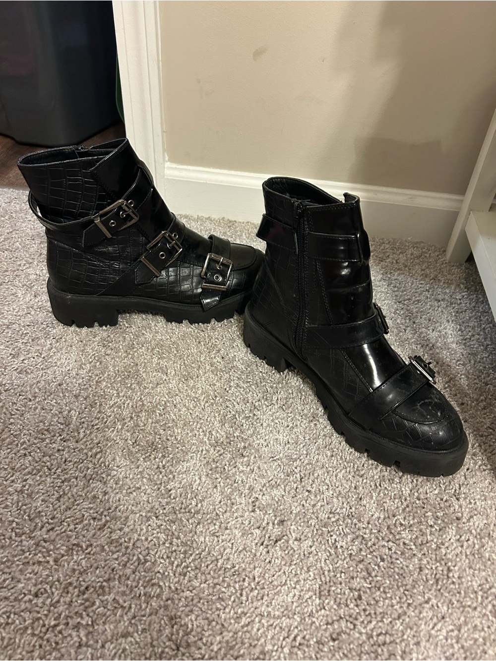 Black faux leather combat boots